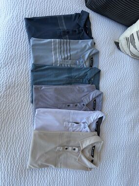 Travis Mathew Men's Polo Pack in Navy, Light Blue, Teal, Gray, White, and Cream